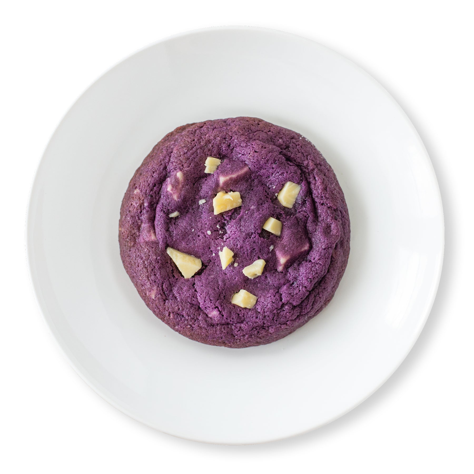 Top view of soft and chewy Ube Blackberry Cookies filled with white chocolate chunks and blackberry jam.