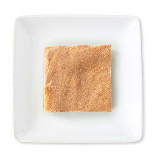 A delectable Brown Sugar & Spice Delight Bar from above—golden layers with a cinnamon glaze, all set to be enjoyed.