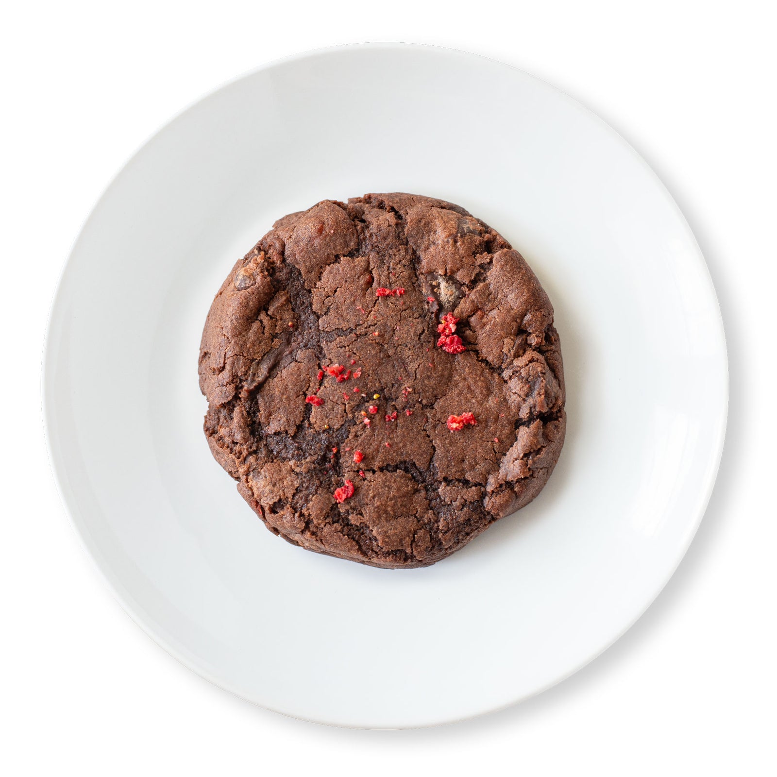 Homemade Chocolate Strawberry Cookies with chocolate chips on a plate.