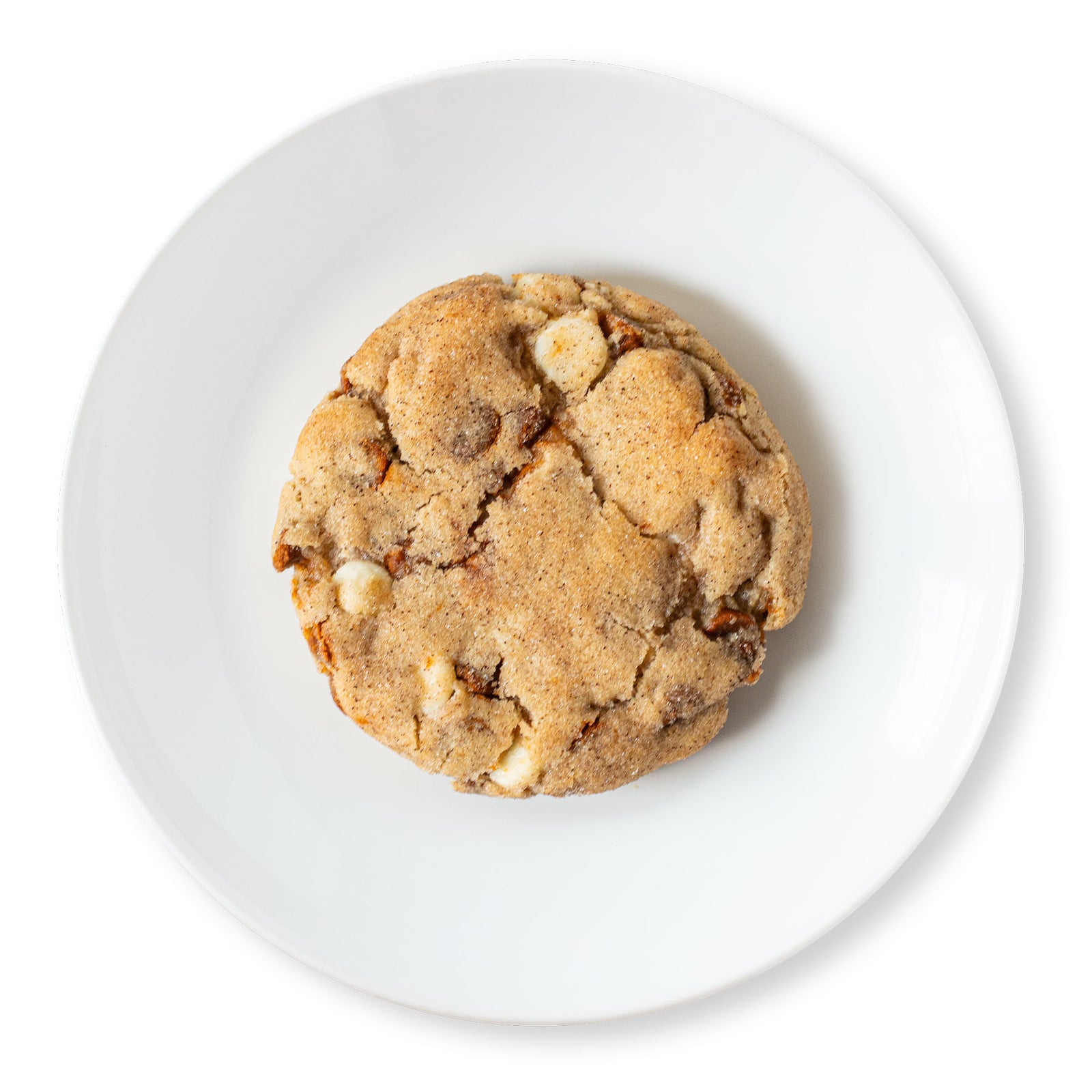 A tantalizing image of Cinnamon Lovers Cookies with visible cinnamon chips and white chocolate chips, coated in a delightful cinnamon sugar crust.