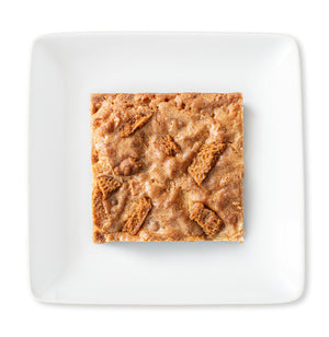 Square Cookie Butter Blondie on a white plate