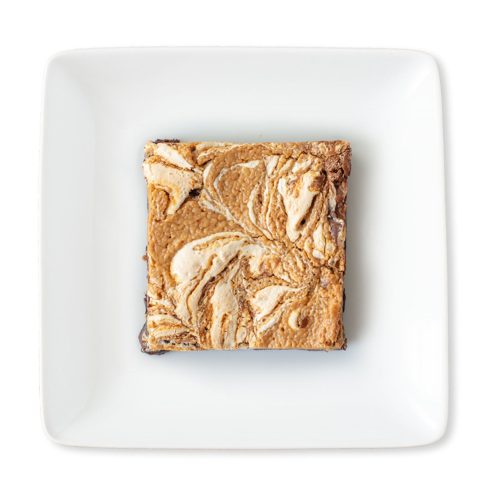 A close-up image of a Fluffernutter Brownie with visible layers of rich chocolate brownie, peanut butter filling, and marshmallow creme.