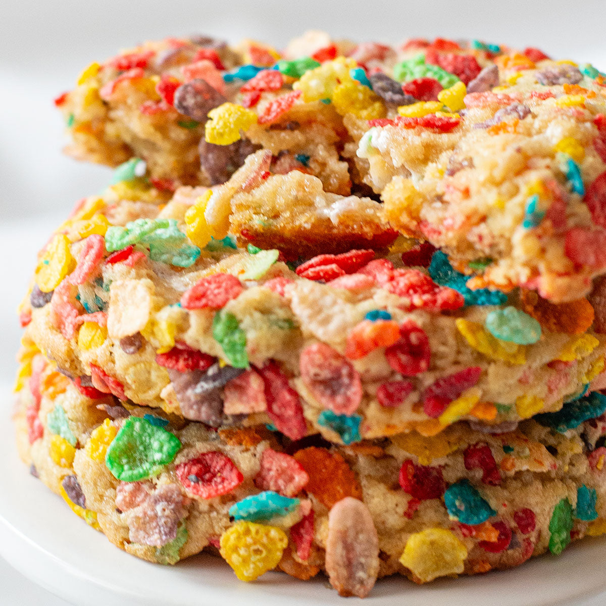 An inviting image of a Fruity Fusion Cookie, showcasing its colorful and playful appearance with fruity cereal pieces and mini marshmallow bits, offering a delightful fusion of flavors and textures.