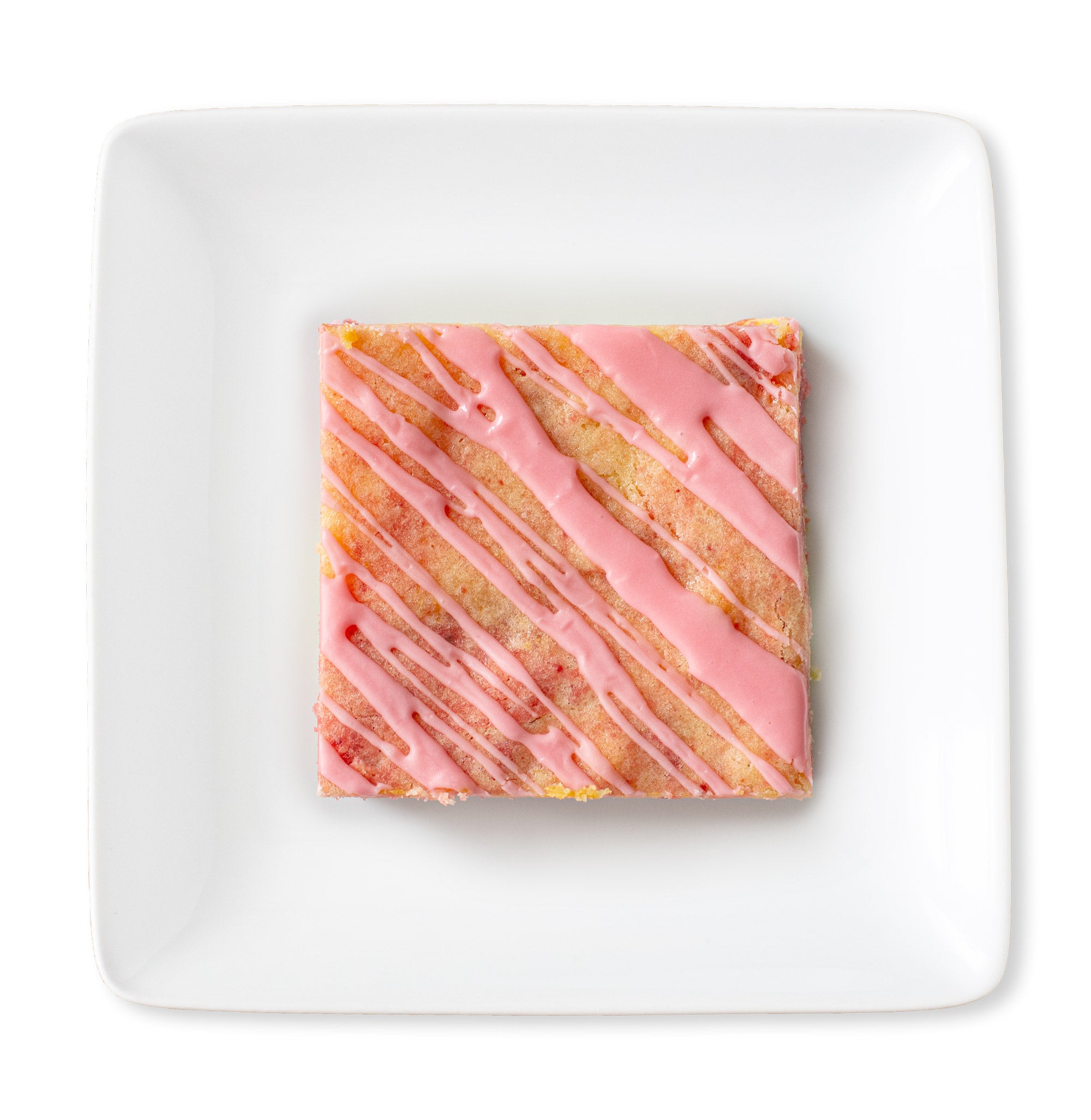 A delectable strawberry lemon blondie showcasing swirls of lemon and strawberry dough, dotted with lemon baking chips, and glazed with a vibrant strawberry topping, promising a harmonious blend of citrus and berry flavors in every slice.