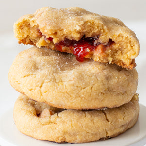 PB&J Cookie - peanut butter cookie with peanut butter chips and stuffed with delicious strawberry jam